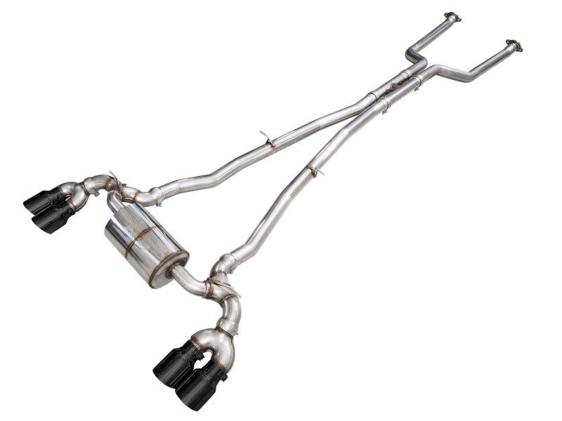 AWE Tuning BMW G90/G99 cat-back exhaust in polished stainless steel with dual black exhaust tips and curved piping.