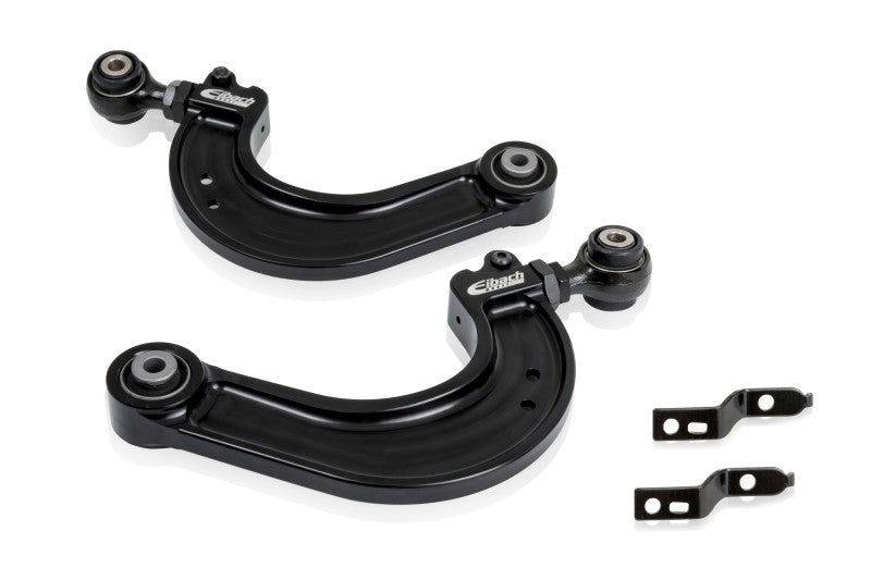 Rear camber arm kit with two black curved metal arms, silver bushings, Eibach logos, and mounting brackets; Eibach Pro-Alignment Rear.