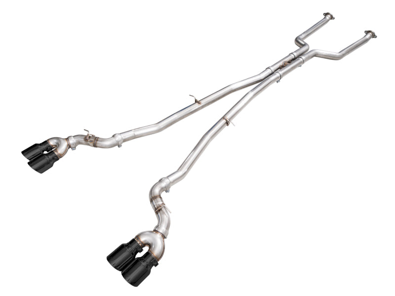AWE Tuning BMW G90/G99 Track Edition cat-back exhaust in polished stainless steel with dual black tips and twin pipes.