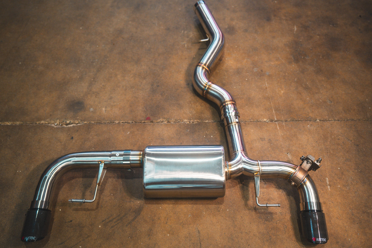 BMW G20/G22 330i/430i with valved axleback exhaust system and quad-chambered muffler