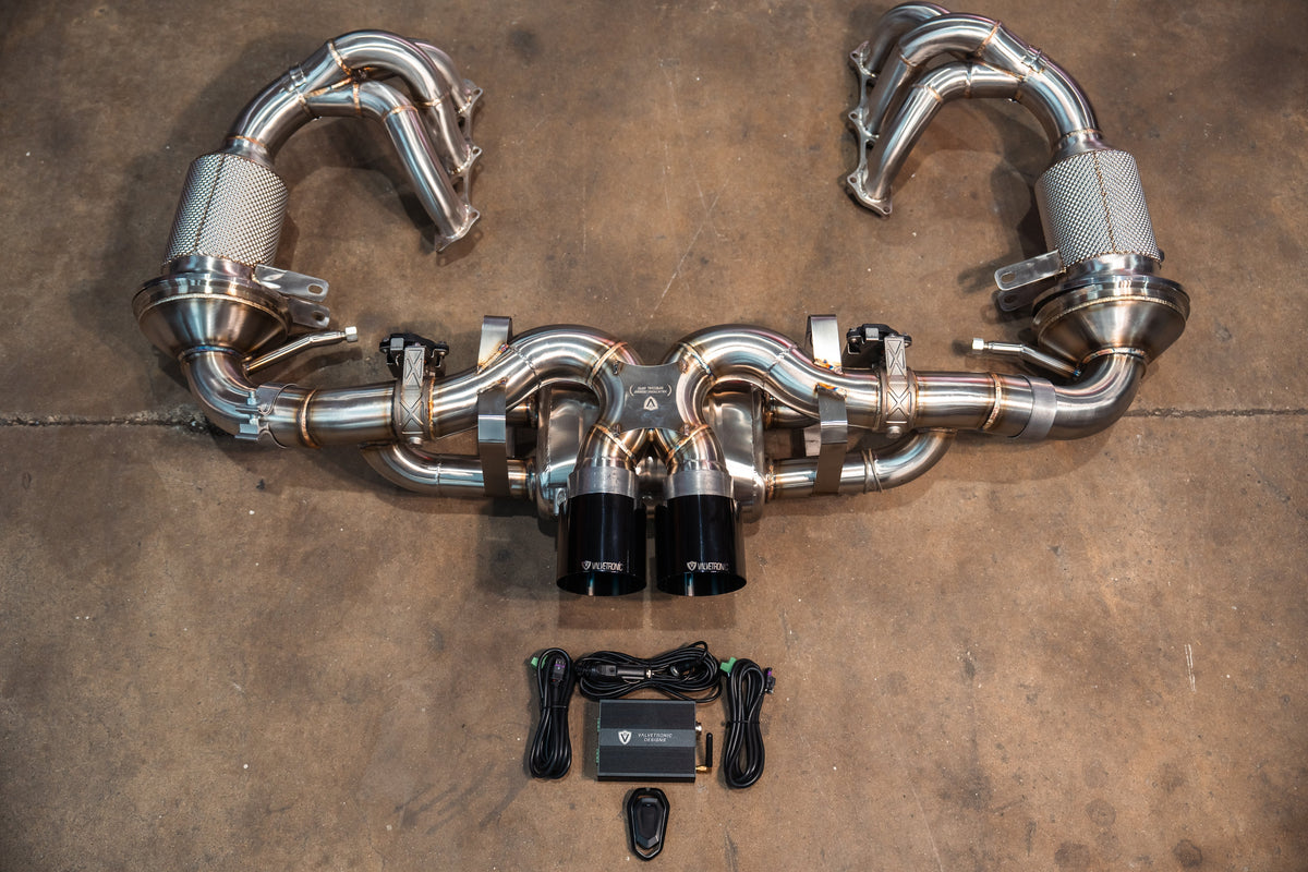 Valvetronic Valved Sport Exhaust System in polished stainless steel, with curved piping, twin black tips, valves and wiring module.