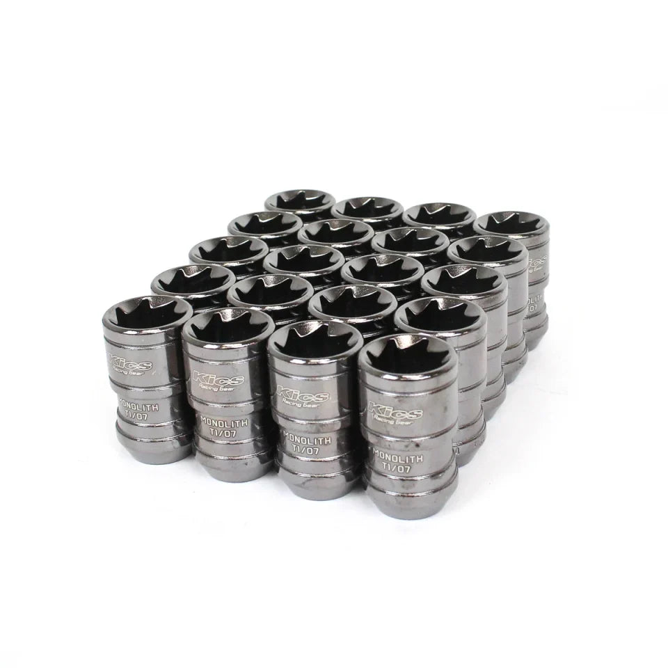Project Kics Monolith TI/07 Lug Nuts, reflective silver metal with cylindrical bodies and star-shaped openings, arranged as a set.