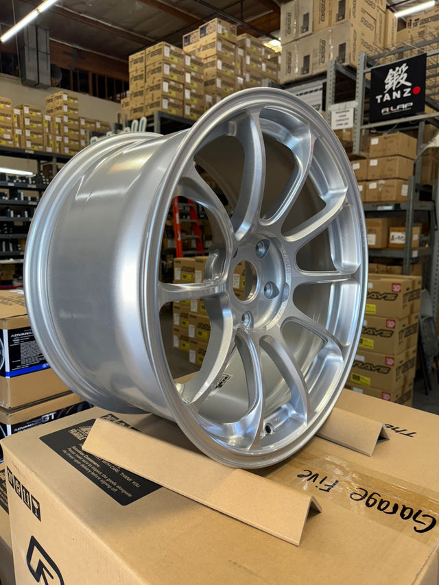 Volk Racing ZE40 M-SPEC 18x10.0 5x120 diamond silver alloy wheel in warehouse setting