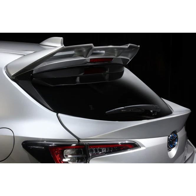 TOM'S Racing Rear Mid Spoiler (Ducktail) for :2019+ Toyota Corolla Hatchback2023+ Toyota GR Corolla Hatchback Available Colors:- FRP Unpainted: 64440-TZE21-Z- BlizzRear SpoilerTOM's Racing