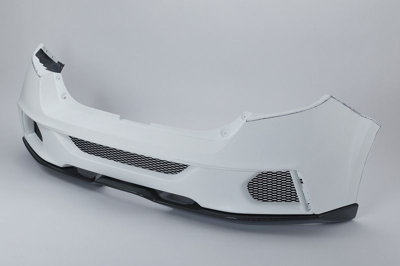 Details
Utilizing the know-how and CFD analysis that we have accumulated in our racing activities, we have developed with the goal of integrating functionality wRear BumperSpoon Sports