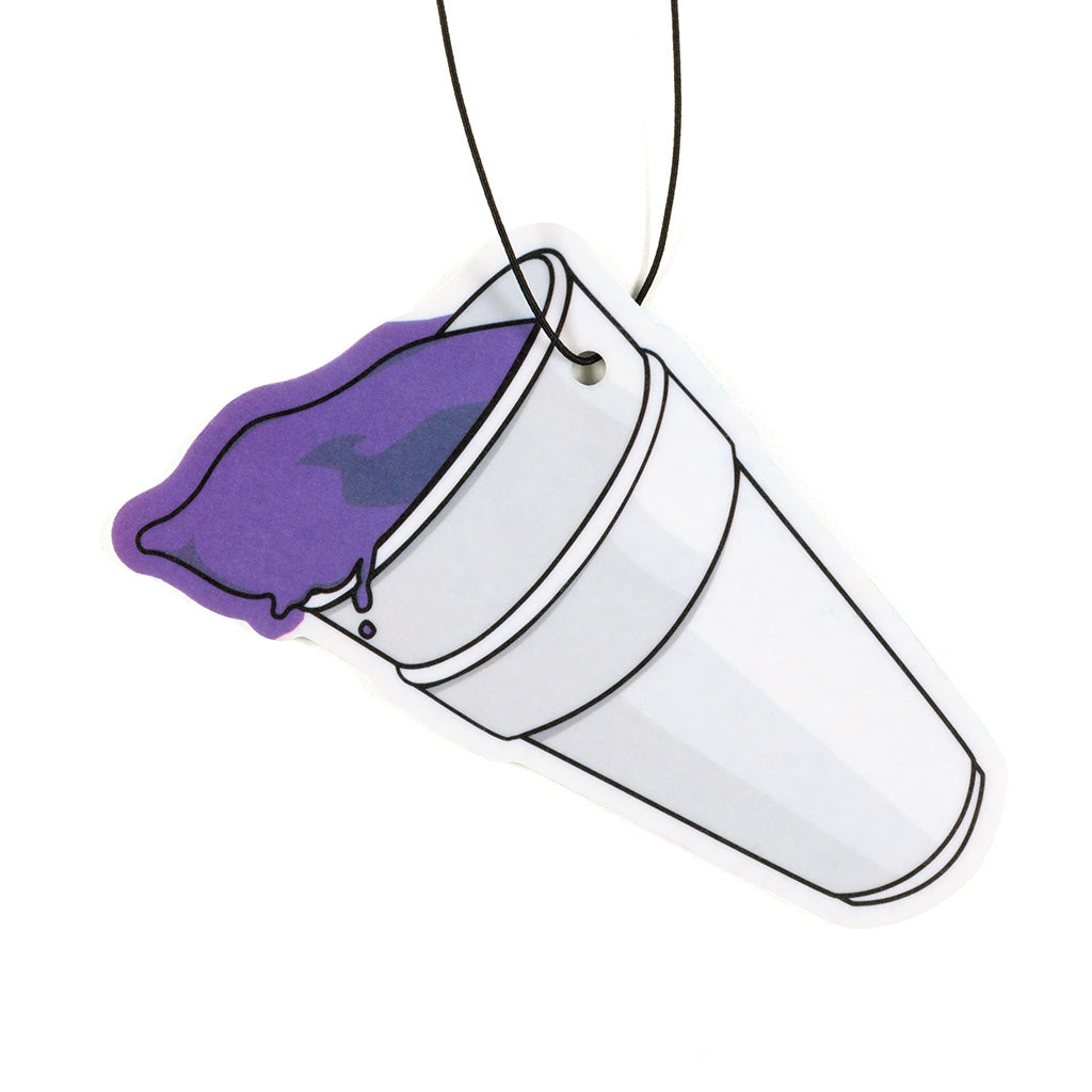 Double Cup Air Freshener with green tea scent hanging from rearview mirror
