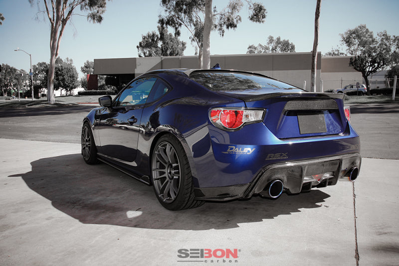 Blue Scion FR-S with Seibon 12-13 Scion FRS carbon fiber rear fin spoiler and aftermarket wheels